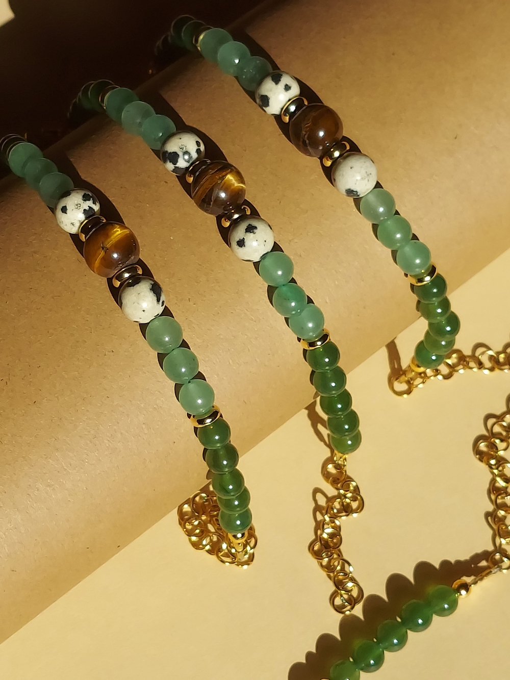 Handmade Gold-Accented Green Beaded Bracelet with Tiger Eye Center